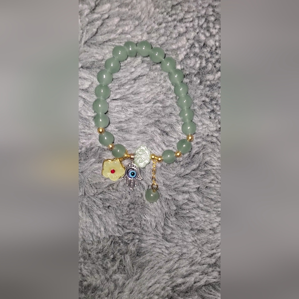 Elegant Beaded Bracelet with evil Eye Charms
